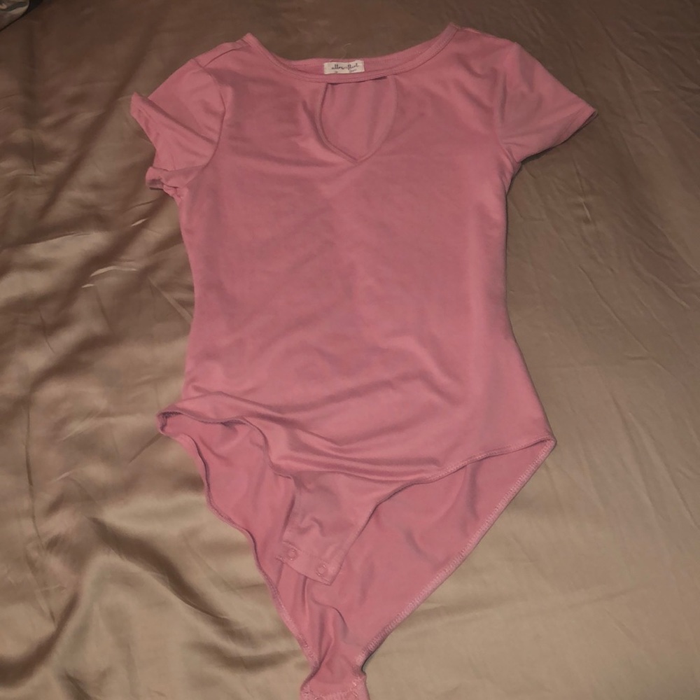A pink bodysuit